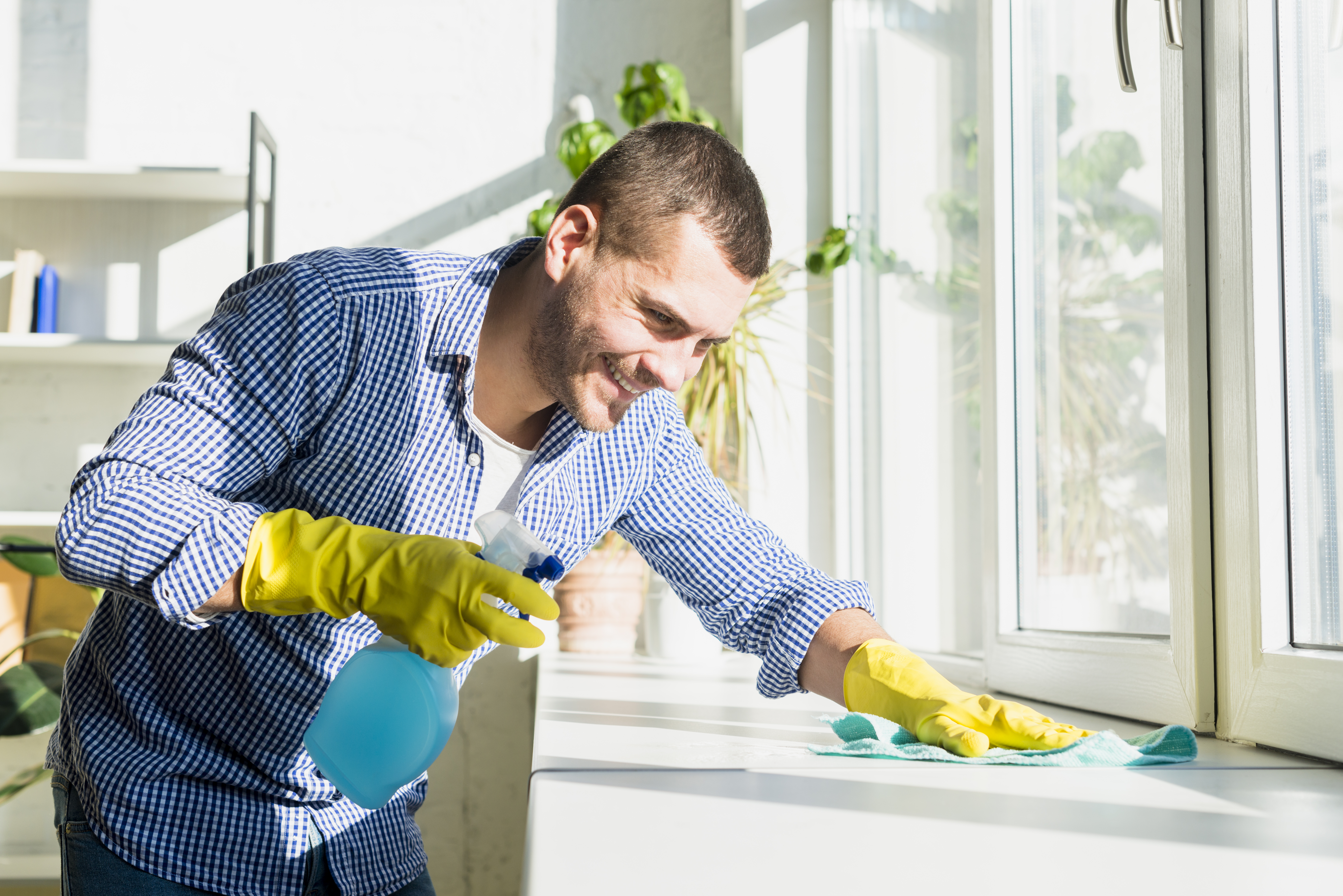 man cleaning his home (6)