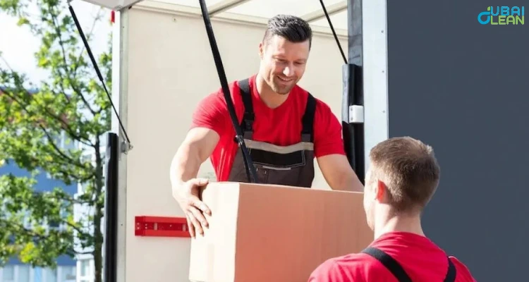 Professional team providing packing and moving services with labeled boxes and moving equipment

