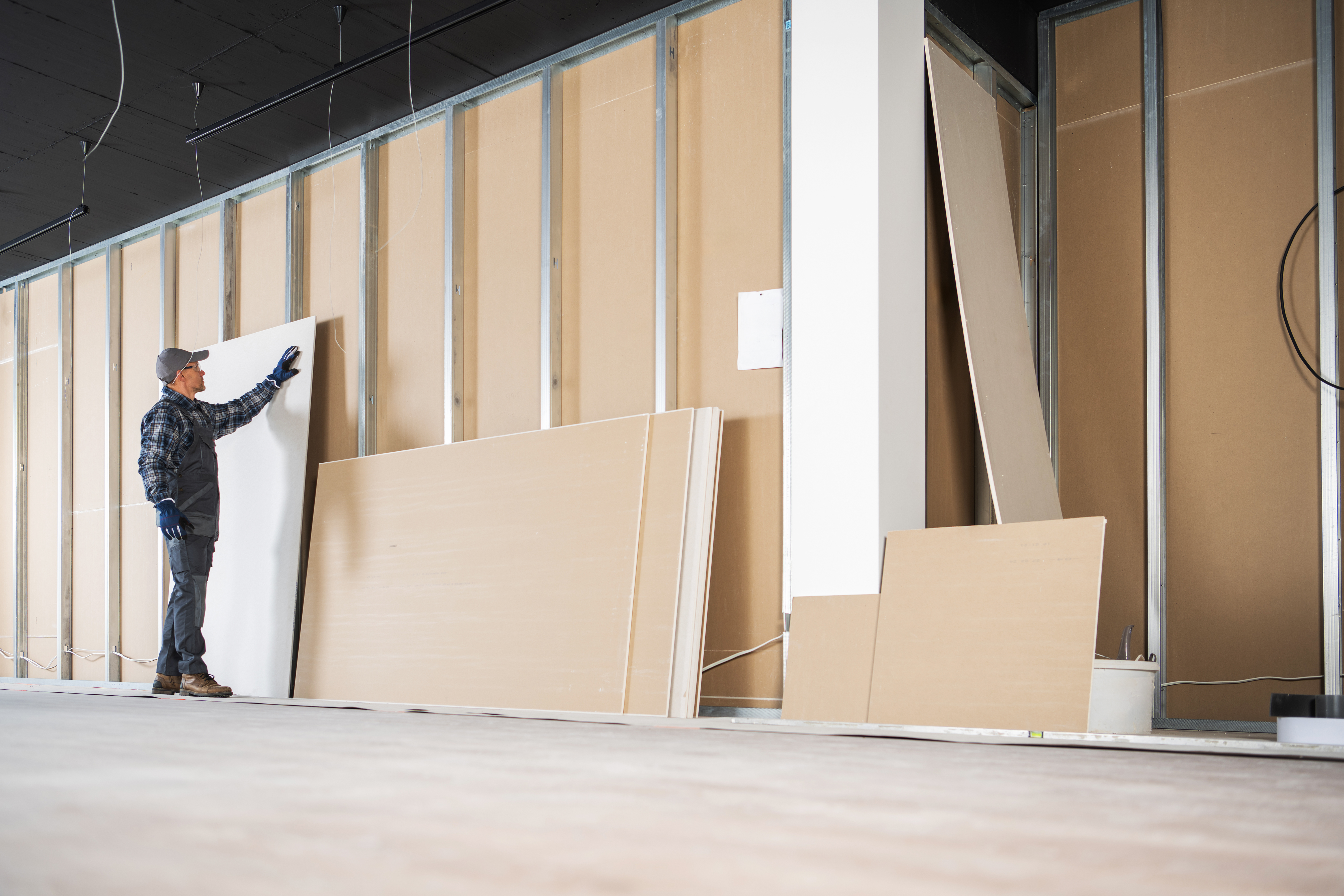 Modern interior with lightweight gypsum partition wall in a stylish living room.

