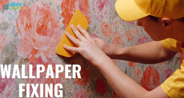 Expert wallpaper fixing Dubai service showing precise installation of beautiful wallpaper patterns